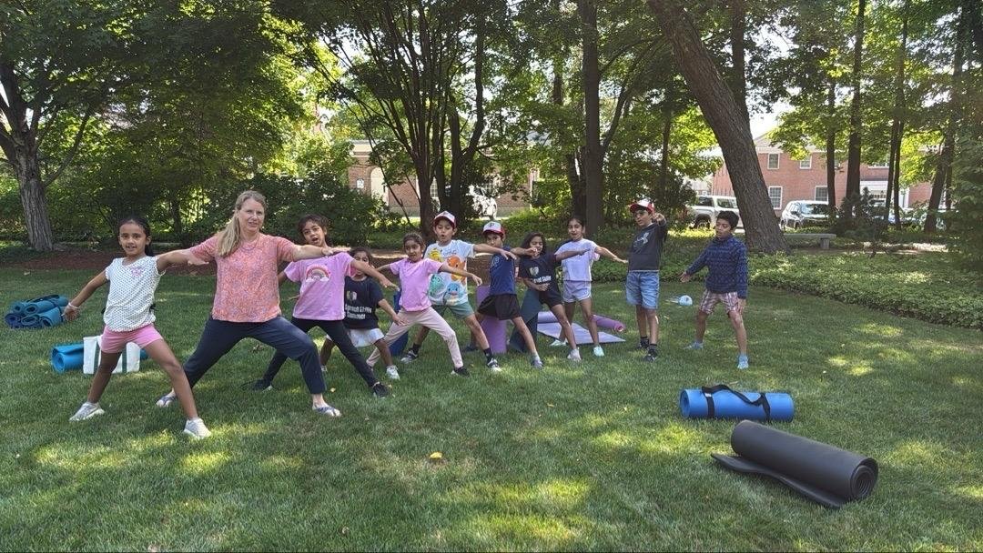 Kids practicing yoga at SkillSprout America